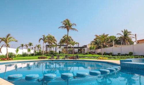 Área del bulevar Barra Vieja Apartamento | Club de Playa, Alberca y Amenidades - Departamento E4