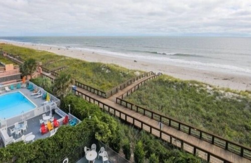 Carolina Beach Condominio | Coastal Cabana - Enjoy The Gorgeous Oceanfront Sunrise From Your 4th Floor Balcony. Walk To The Carolina Beach Boardwalk 2 Bedroom Condo by Redawning