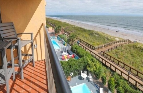 Carolina Beach Condominio | Coastal Cabana - Enjoy The Gorgeous Oceanfront Sunrise From Your 4th Floor Balcony. Walk To The Carolina Beach Boardwalk 2 Bedroom Condo by Redawning