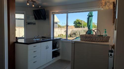 Waitarere Beach Apartamento | Coastal Condo