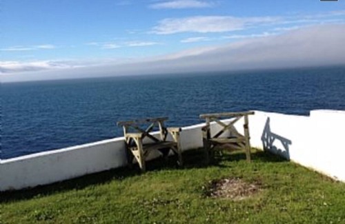 Glenariff Cabaña | Cabaña costera, histórica y galardonada, frente al mar absoluto.