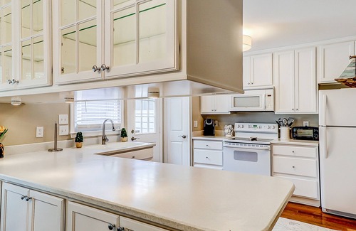 Old Village Villa | Coastal cottage with yard, near shopping & dining in Old Village District