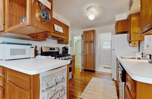 Pocasset Casa | Coastal dog-friendly cottage near Hen Cove with sunroom, beach access, & games