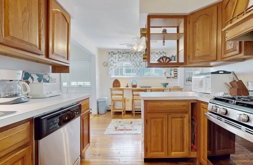 Pocasset Casa | Coastal dog-friendly cottage near Hen Cove with sunroom, beach access, & games