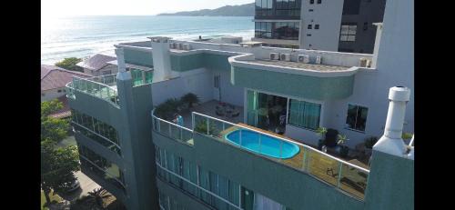 Canto Grande Apartamento | Cobertura com Piscina 50 mt do Mar