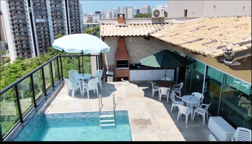 Tombo Apartamento | Cobertura Luxuosa, pe na areia - Exclusividade na Praia do Tombo, Guarujá, a Mais Premiada com Bandeira Azul no Brasil