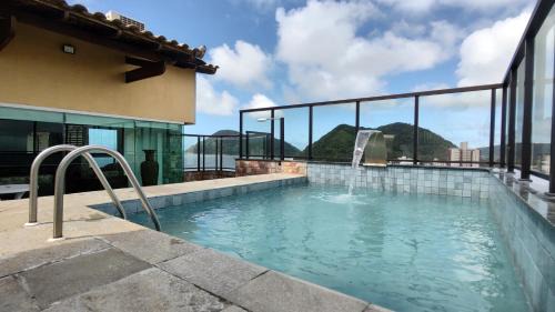 Tombo Apartamento | Cobertura Luxuosa, pe na areia - Exclusividade na Praia do Tombo, Guarujá, a Mais Premiada com Bandeira Azul no Brasil