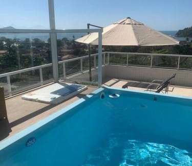 Toninhas Apartamento | Cobertura Mar c/piscina particular frente pro mar