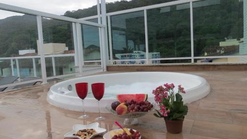 Praia Grande Apartamento | Cobertura Santorini Nova com Spa e Solário na Praia Grande