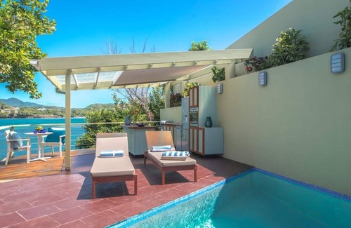 Fort Jeudy Villa | FRENTE AL MAR CLIFFSIDE PISCINA PRIVADA VILLA DE 1 DORMITORIO - 1,100SF