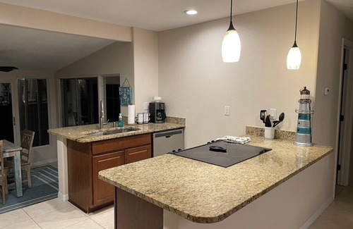 Laurel Casa | Coco NoKo cozy beach cottage + Swimming pool! Golf cart and pet friendly!