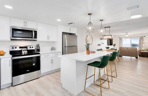 Port Canaveral Condominio | Cocoa Beach Towers by Happy Palm Stays