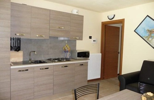 Colico Apartamento | Colico: villatrecariole x 4 adultos + 1 bebé con vista a la piscina, a la montaña y al lago