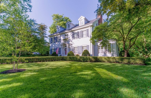 Sidney Casa | Colonial Home on Wooded Lot