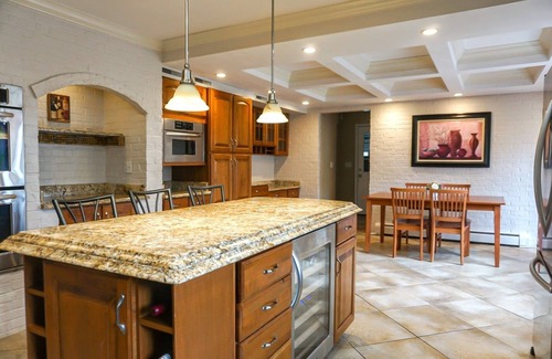 Benton Harbor Casa | Colonial style 5BR/5BA home tucked in a private, wooded setting w/pool & hot tub