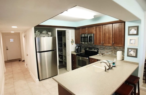 Butler Beach Condominio | Colony Reef 1408, recientemente remodelado, condominio con vista al mar 3BR / 2BA con WiFi privado