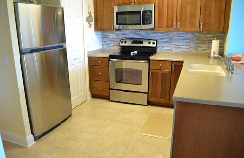 Butler Beach Condominio | Colony Reef 1408, recientemente remodelado, condominio con vista al mar 3BR / 2BA con WiFi privado