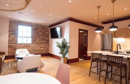 New Orleans Hotel | Colorful 4BR Suite w/ Pool steps to St. Charles Ave!