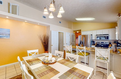 Panama City Beach Cabaña | Colorful home near the beach with 2 pools, bikes, beach gear, W/D, & AC