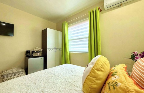 Simpson Bay Hotel | Comfort Room 9 with AC and Rooftop Pool