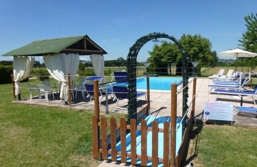 Torgiano Apartamento | Confortable apartamento en una casa de campo con piscina cerca de Asís y Perugia
