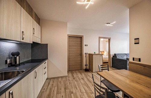 Predazzo Apartamento | Cómodo apartamento "Vacanze Arcobaleno - Verde" con vistas a la montaña