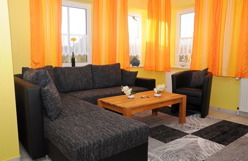 Neßmersiel Apartamento | Cómodo apartamento en el dique, apto para niños, jardín, silla de playa, WiFi