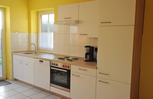 Neßmersiel Apartamento | Cómodo apartamento en el dique, apto para niños, jardín, silla de playa, WiFi