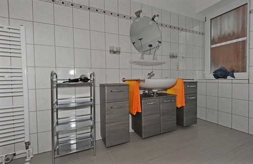 Neßmersiel Apartamento | Cómodo apartamento en el dique, apto para niños, jardín, silla de playa, WiFi