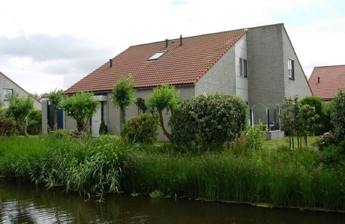 Julianadorp aan zee Casa | Cerca de la playa, acogedora villa privada, rodeada de campos de tulipanes y campo de golf