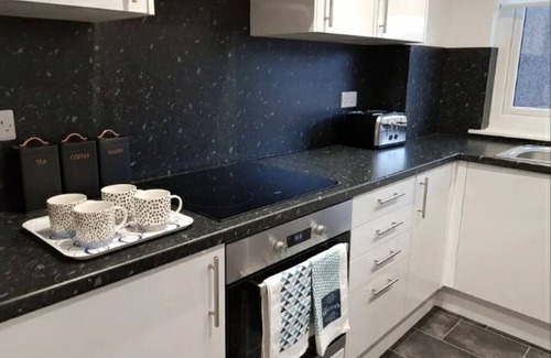 East Kilbride Apartamento | Cómodo espacio moderno a poca distancia del centro comercial East Kilbride Shopping, a 25 minutos del centro de Glasgow.