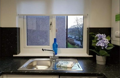 East Kilbride Apartamento | Cómodo espacio moderno a poca distancia del centro comercial East Kilbride Shopping, a 25 minutos del centro de Glasgow.