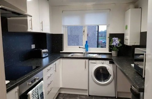 East Kilbride Apartamento | Cómodo espacio moderno a poca distancia del centro comercial East Kilbride Shopping, a 25 minutos del centro de Glasgow.