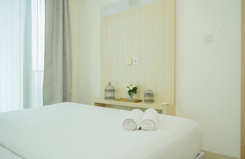 Cikokol Apartamento | Comfy and Tidy 1BR Apartment at Tree Park City BSD