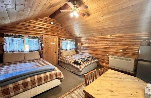Cooke City-Silver Gate Cabina | Comfy cabin is situated on the Silver Gate property which overlooks 10,000ft tall mountain peaks surrounding the town.