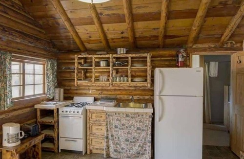 Cooke City-Silver Gate Cabina | Comfy cabin is situated on the Silver Gate property which overlooks 10,000ft tall mountain peaks surrounding the town.