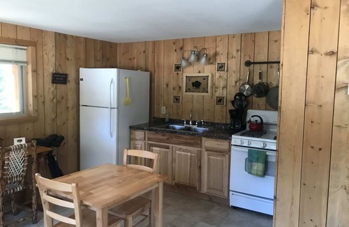Cooke City-Silver Gate Cabina | Comfy cabin is situated on the Silver Gate property which overlooks 10,000ft tall mountain peaks surrounding the town.