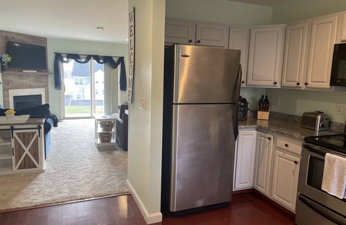 Laconia Condominio | Comfy lake condo, great location to swim, boat, hike, ski & more!