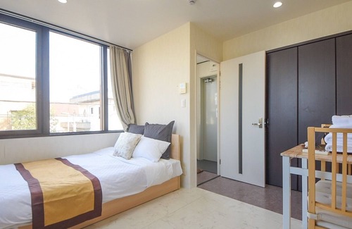 Nara Apartamento | Cinema studio / Nara Nara