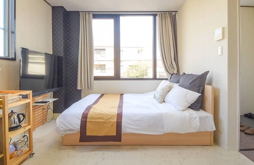 Nara Apartamento | Cinema studio / Nara Nara