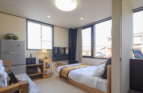 Nara Apartamento | Cinema studio / Nara Nara