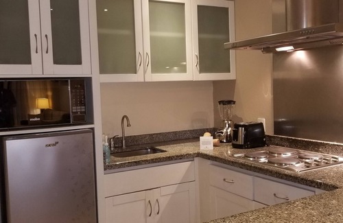 Villa Juarez Complejo | Condo, with Jacuzzi and mini pool at porch. A beach nearby with lot of amenities