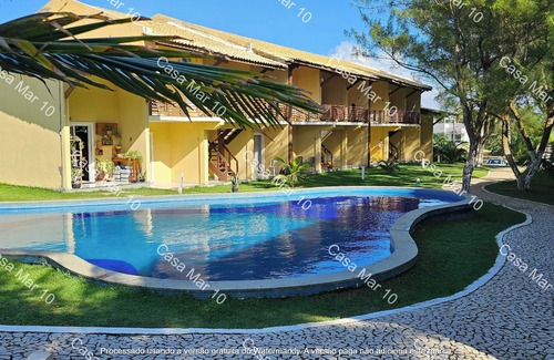 Arembepe Apartamento | Condomínio Frente mar pé na Área, Piscinas Naturais! Casa Térreo Aconchegante