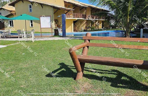 Arembepe Apartamento | Condomínio Frente mar pé na Área, Piscinas Naturais! Casa Térreo Aconchegante