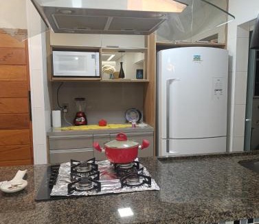 Guilhermina Apartamento | Condomínio Jardim do Mar
