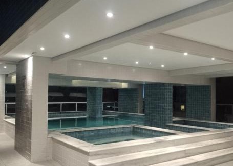 Caicara Apartamento | condominio clube com piscina climatizada com fechamento em vidro - Vila Caiçara - Praia Grande 4 adultos e 1 criança até 12 anos