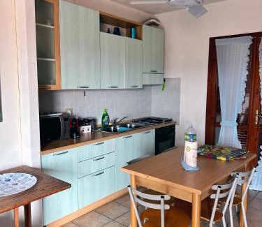 San Pasquale Casa | Confortevole Trilocale con Vista Mare a San Pasquale, Sardegna