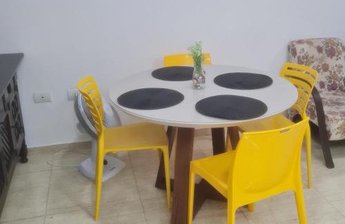 Tombo Apartamento | conforto a 2 minutos da praia do tombo com Wi-Fi e garagem Condomínio Parks Garden