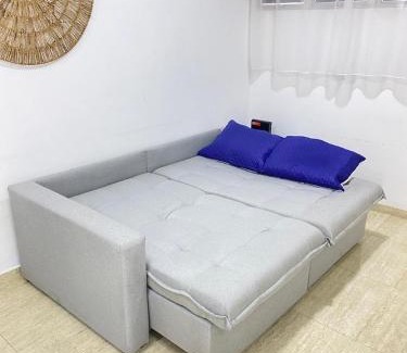 Tombo Apartamento | conforto a 2 minutos da praia do tombo com Wi-Fi e garagem Condomínio Parks Garden