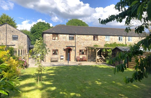 Liverton Casa | Piedra convertida y granero de madera en entorno rural en el borde de Dartmoor